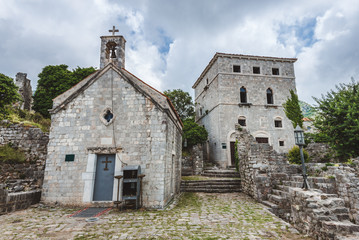 Fototapeta na wymiar Stari Bar - ruined medieval city on Adriatic coast, Unesco World Heritage Site. Ancient stone serbian church with bell tower.