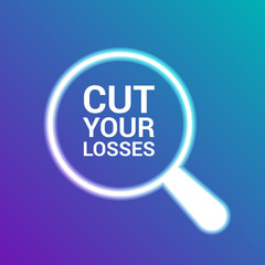Business Concept: Magnifying Optical Glass With Words Cut Your Losses