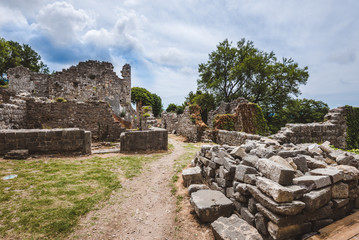 Ancient stone ruins and fortress wall of Old Bar town, Montenegro. Stari Bar panoramic view - ruined medieval city and archeological place on Adriatic coast, Unesco World Heritage Site.