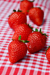 Fresh Strawberries with Red And White Checkered Clothing