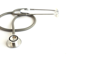 Gray stethoscope isolated on white background.