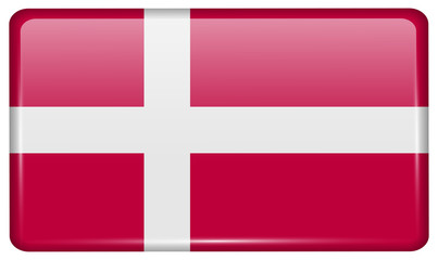 Obraz premium Flags Denmark in the form of a magnet on refrigerator with reflections light.
