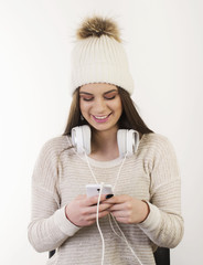 A young girl with headphones