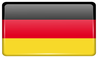 Obraz premium Flags Germany in the form of a magnet on refrigerator with reflections light.