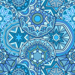 Blue colors abstract seamless pattern. Ornate fancy rounds arranged for ethnic style ornament.