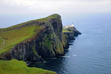 Neist point Lighthouse. Cloudy day. Isle of Skye, Scotland.