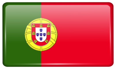 Flags Portugal in the form of a magnet on refrigerator with reflections light.