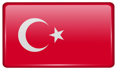Flags Turkey in the form of a magnet on refrigerator with reflections light.