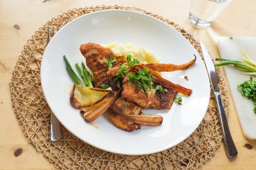 Spicy roasted sliced fish and vegetable, mashed potato.