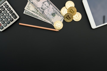 Digital money BITCOIN calculator and currency money on black background ,abstract finance technology concept
