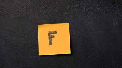 Sticky note with letter 
