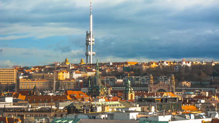 Obraz premium Panorama of the city of Prague. The old part of the city. Beautiful roofs of shingles. Ancient buildings and churches.