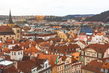 Fototapeta na wymiar Panorama of the city of Prague. The old part of the city. Beautiful roofs of shingles. Ancient buildings and churches.
