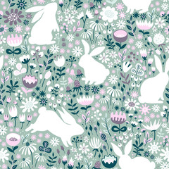 Seamless pattern from silhouettes of rabbits and wildflowers