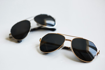 Stylish sunglasses pair isolated on white background