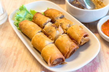 Spring roll fried Vietnamese food in white dish