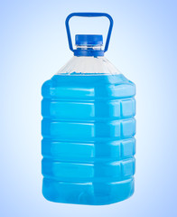 Big plastic bottle blue liquid water isolated