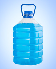 Big plastic bottle blue liquid water isolated