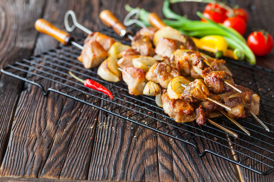 Skewers of grilled vegetables and meat
