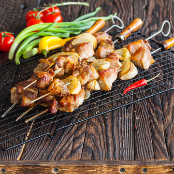 Skewers of grilled vegetables and meat
