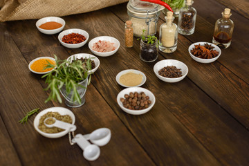 Obraz na płótnie Canvas Various spices against a dark background. Food ingredients