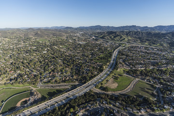 Aerial view of route 23 freeway, homes and parks in suburban Thousand Oaks near Los Angeles, California.