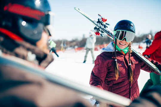 Skiers with skis and poles, extreme lifestyle
