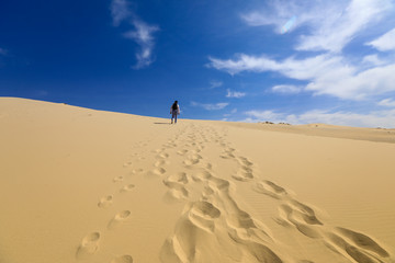 Fototapeta na wymiar Footsteps on the dunes of Pyla, France