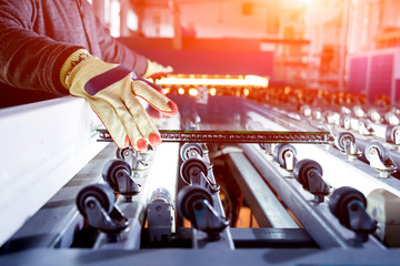 Conveyor belt for production a window pane. Industrial equipment.