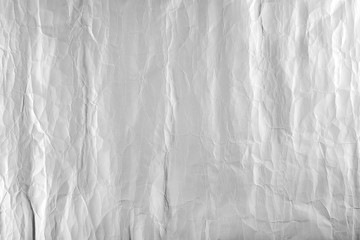 Wrinkled white paper sheet background Close up