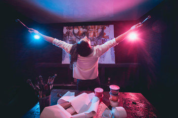 The young artist at work in the studio. Canvas on the background