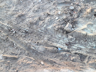 traces of wheels on the ground