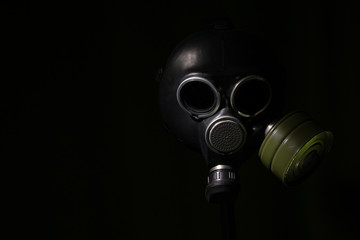 gas mask on a black background