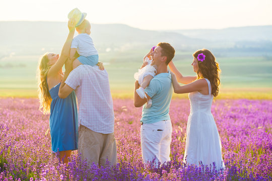 Two friendly family in a lavender field
