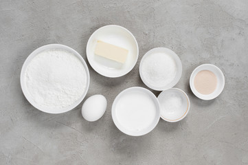Ingredients for baking on the textured gray table