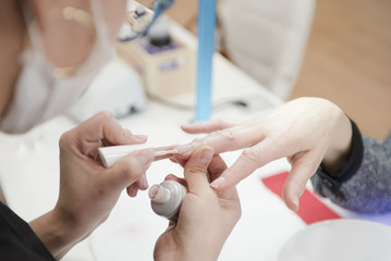 Fototapeta na wymiar manicure in a beauty salon