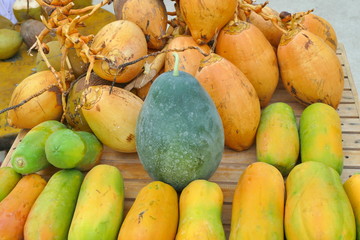 Papayas, coconuts and watermelon on street market, Maldive island