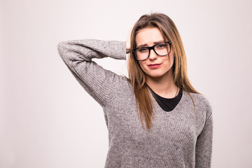 Young student posing over a white background