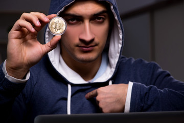 Young man in bitcoin mining concept