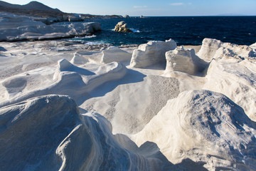 Mineral formations on the coast of Milos island (Moon landscape) Aegean sea, Greece.