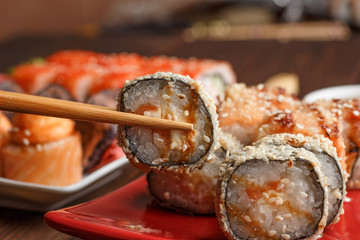 Sushi roll set and bamboo sticks, close up, Japanese seafood