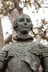 Los Angeles, CA, USA - April 5, 2018: Closeup of head and torso of Green Bronze statue of Spanish King Carlos III, ordered the founding of El Pueble Los Angeles.