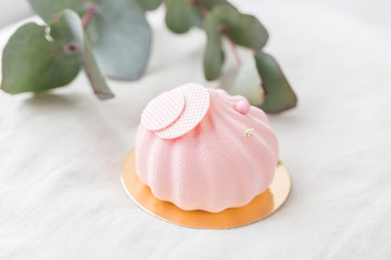 Pastel pink cake on white table. Little dessert served with tea or coffee. wallpaper, Horizontal photo
