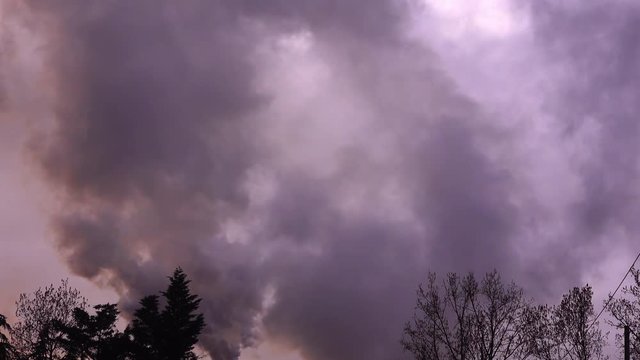 Clouds of smoke inl the sky.