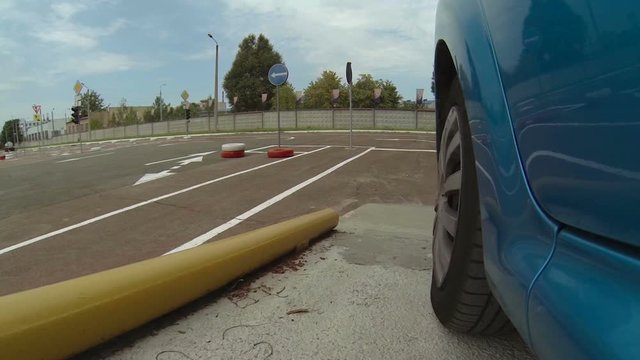 Vehicle starting driving examination, demonstrating turning maneuvering, safety