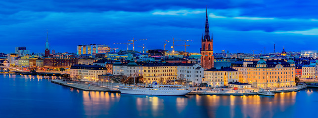 Panoramic sunset view onto Stockholm old town Gamla Stan and Riddarholmen church in Sweden