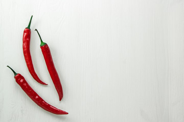 red hot peppers on a white background