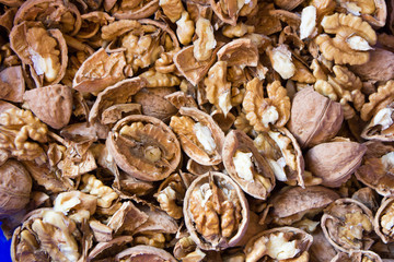 Walnuts with broken nutshells. Not yet husked.
