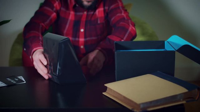 4k Young Man Unboxing New Smart Home Device