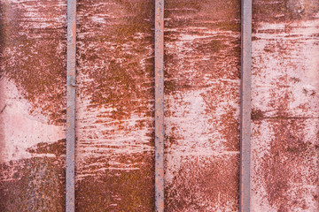 texture rusty metal with three vertical square rods, abstract background